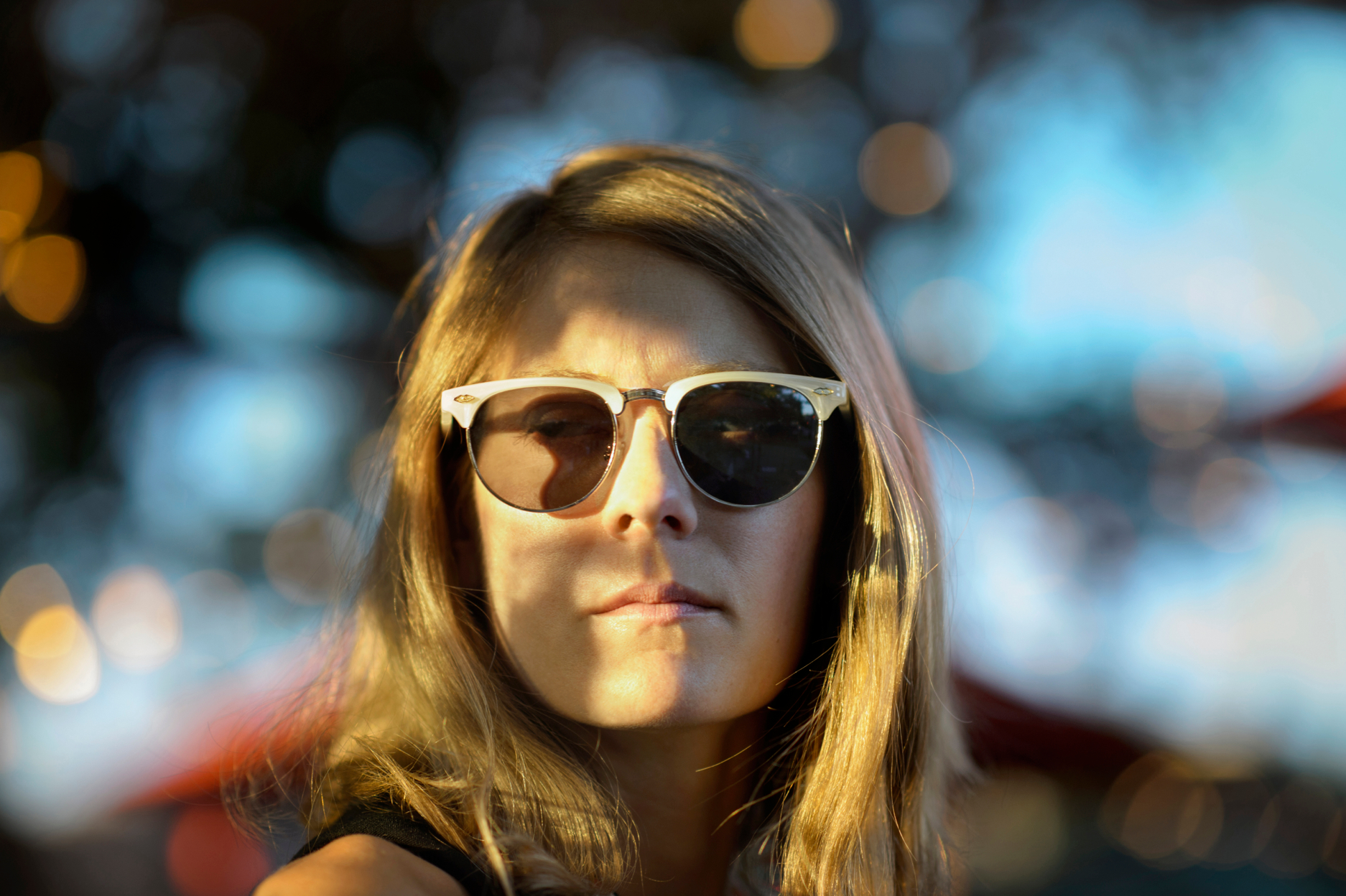 young woman with sunglasses and shodows
